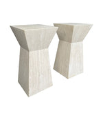 A pair of interesting shaped Italian 1970s travertine pedestals / bedside tables