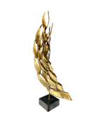 A large mid century brass torch cut, abstract sculpture attributed to Curtis Jere