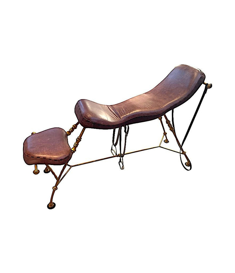 A Mark Brazier Jones "Tally Ho" chair a sculptural chair upholstered in a tan leather, with leather reigns, straps and steel stirrups on a stylised gilt wrought iron frame