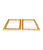 A pair of large square mirrors with thick bamboo frames