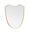 AN ORIGNAL 1960S GIO PONTI STYLE, ITALIAN SHIELD MIRROR WITH BRASS FRAME