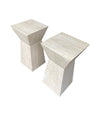 A pair of interesting shaped Italian 1970s travertine pedestals / bedside tables