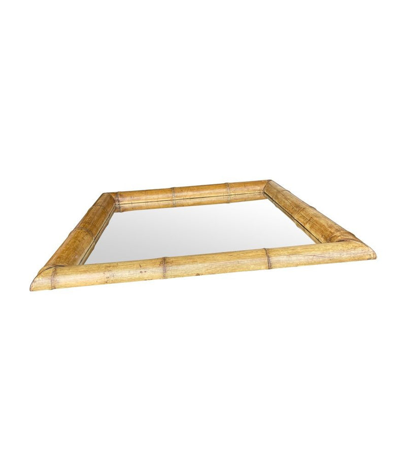 A large square mirror with a thick bamboo frame