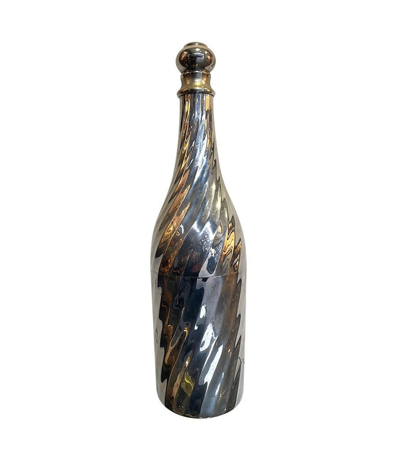 A LARGE 1950S SILVER PLATED CHAMPAGNE BOTTLE COOLER IN THE SHAPE OF A CHAMPAGNE BOTTLE