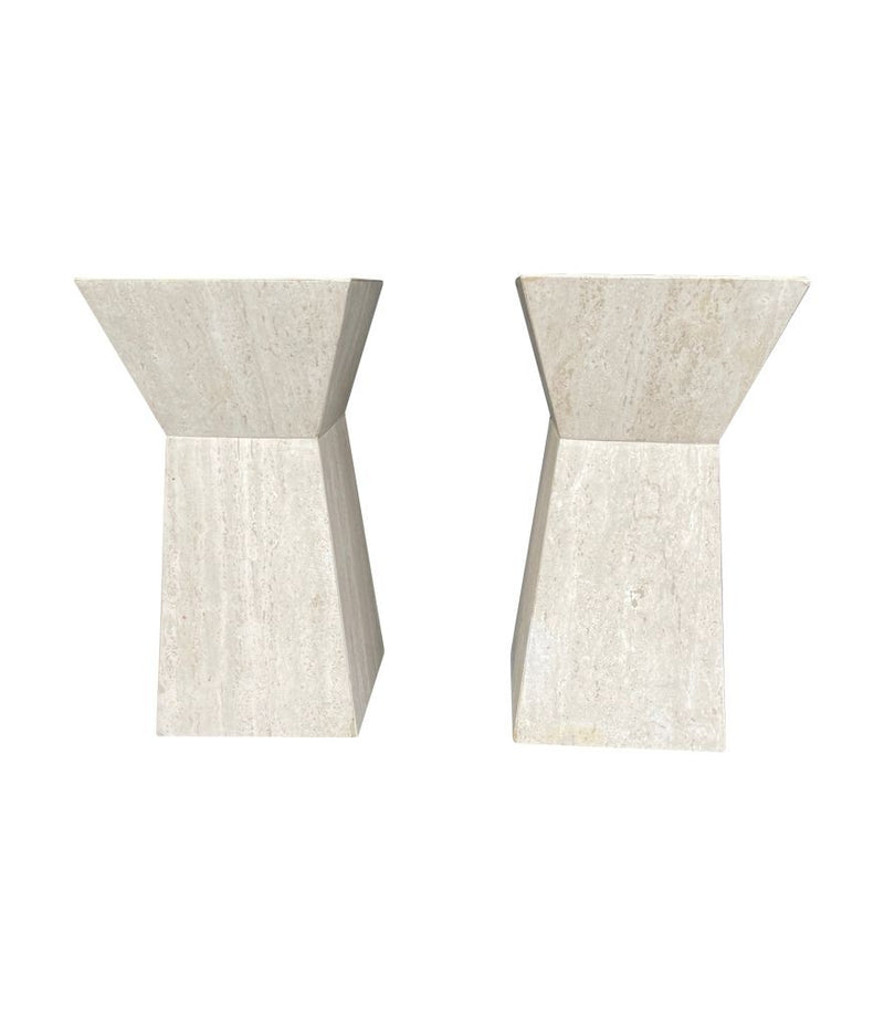 A pair of interesting shaped Italian 1970s travertine pedestals / bedside tables