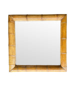 A large square mirror with a thick bamboo frame