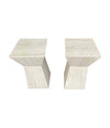 A pair of interesting shaped Italian 1970s travertine pedestals / bedside tables