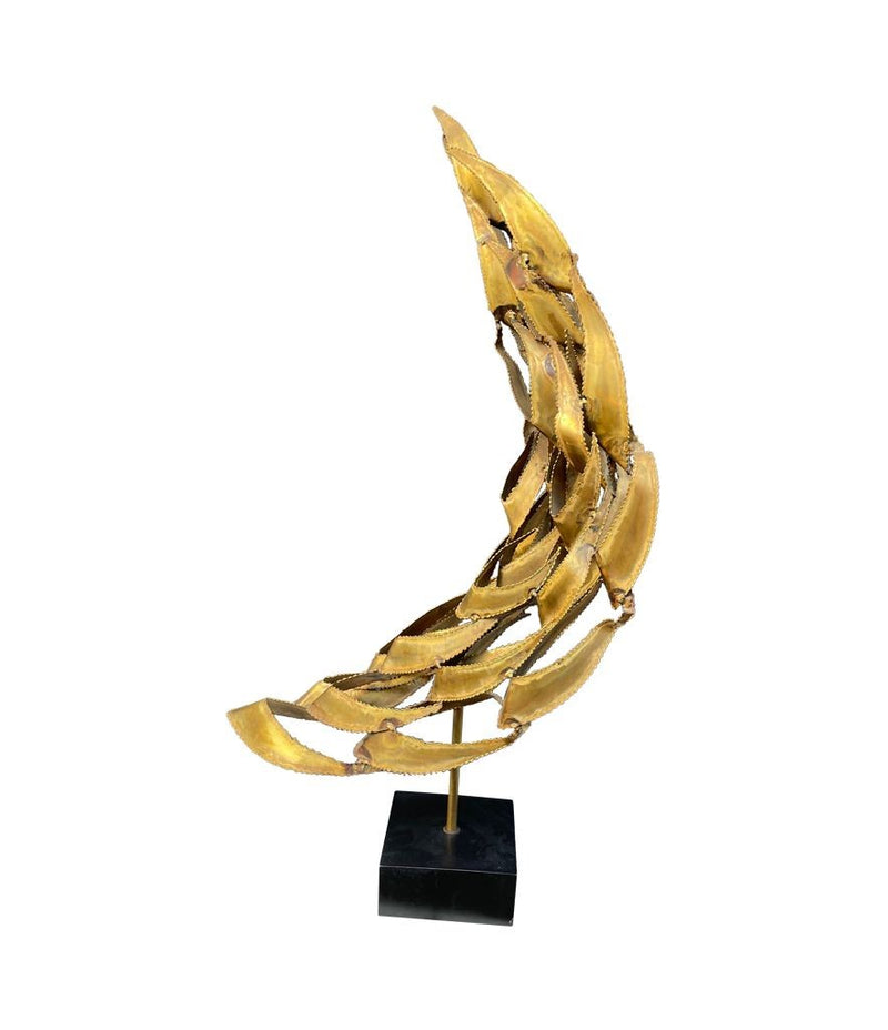 A large mid century brass torch cut, abstract sculpture attributed to Curtis Jere