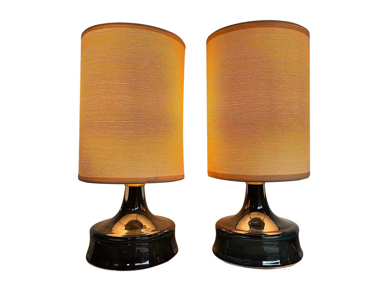 A pair of Swedish Orrefors blue glass lamps by Carl Fagerlund with brass collar