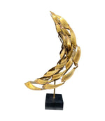 A large mid century brass torch cut, abstract sculpture attributed to Curtis Jere