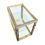 A CHROME AND BRASS BAR CART BY ZEVI