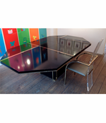 A BLACK MAHEY DINING TABLE