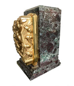 A PAIR OF ART DECO BOOKENDS OF AMAZONITE MARBLE AND CAST GILT METAL BEES