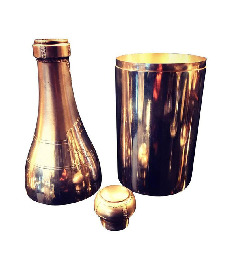 A RARE SILVER PLATED CHAMPAGNE BOTTLE COCKTAIL SHAKER