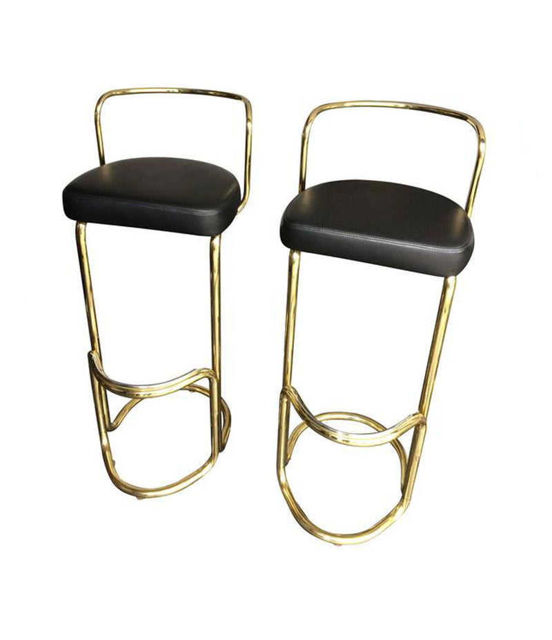 A SET OF FOUR BRASS BAR STOOLS