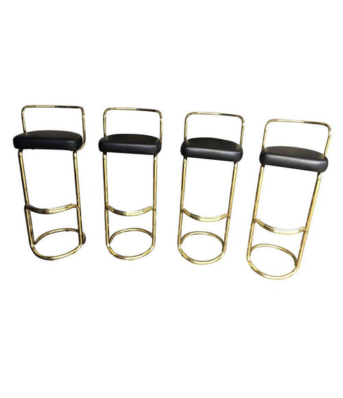 A SET OF FOUR BRASS BAR STOOLS