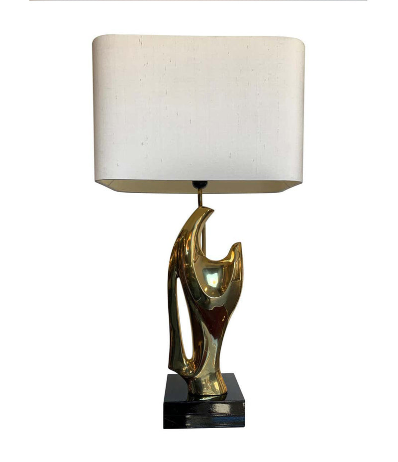 A 1970S SCULPTURAL LAMP IN THE STYLE OF ALAIN CHERVET WITH BLACK LACQUERED BASE