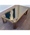 A BRASS COFFEE TABLE