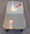 A BRASS COFFEE TABLE
