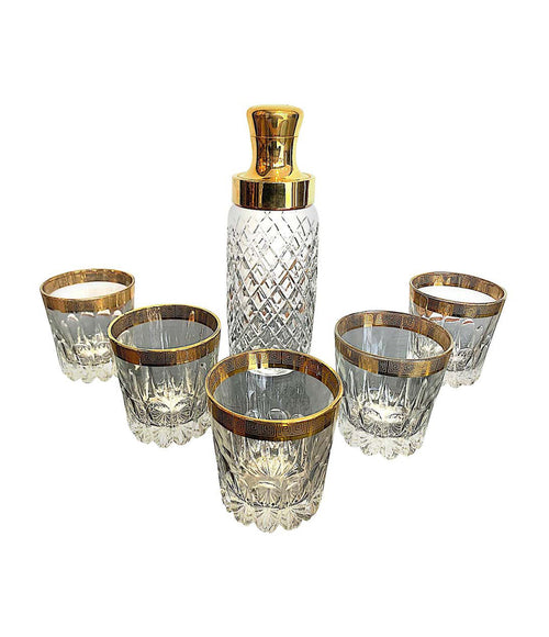 CRYSTAL AND GILT COCKTAIL SET WITH SHAKER AND SIX MATCHING GILT EDGED TUMBLERS