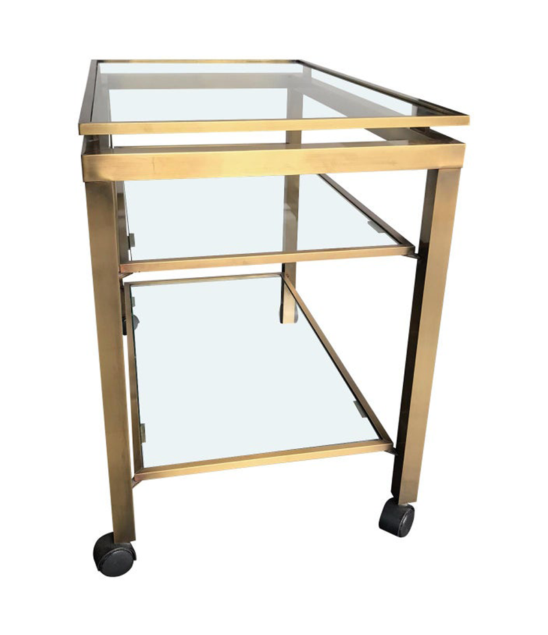 GUY LEFEVRE STYLE GILT METAL BAR TROLLEY WITH THREE GLASS SHELVES