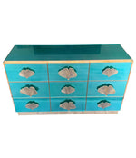 ITALIAN AQUA GREEN MIRRORED CHEST OF DRAWERS WITH BRASS CORAL SHAPED HANDLES