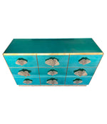 ITALIAN AQUA GREEN MIRRORED CHEST OF DRAWERS WITH BRASS CORAL SHAPED HANDLES