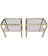 PAIR OF ITALIAN BRASS SIDE TABLES WITH SMOKED GLASS SHELVES