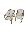 PAIR OF ITALIAN BRASS SIDE TABLES WITH SMOKED GLASS SHELVES