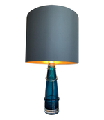 PAIR OF ORREFORS TURQUOISE GLASS LAMPS WITH BRASS FITTINGS AND BESPOKE SHADES