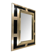 PHILIPPE JEAN BRUSHED BRASS FINISH AND BLACK LUCITE MIRROR, SIGNED