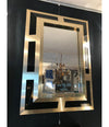 PHILIPPE JEAN BRUSHED BRASS FINISH AND BLACK LUCITE MIRROR, SIGNED