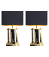 PAIR OF ITALIAN BRASS AND BLACK METAL LAMPS