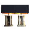 PAIR OF ITALIAN BRASS AND BLACK METAL LAMPS